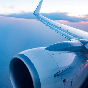 airplane flying in the clouds