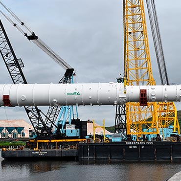 Air Products' MCR (R) Main Cryogenic Heat Exchanger being loaded onto a ship