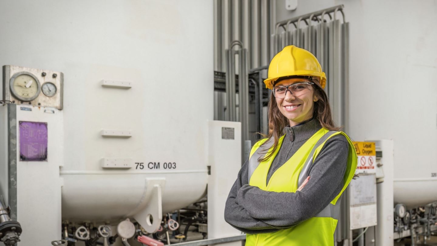 Female plant operator wearing hard hat